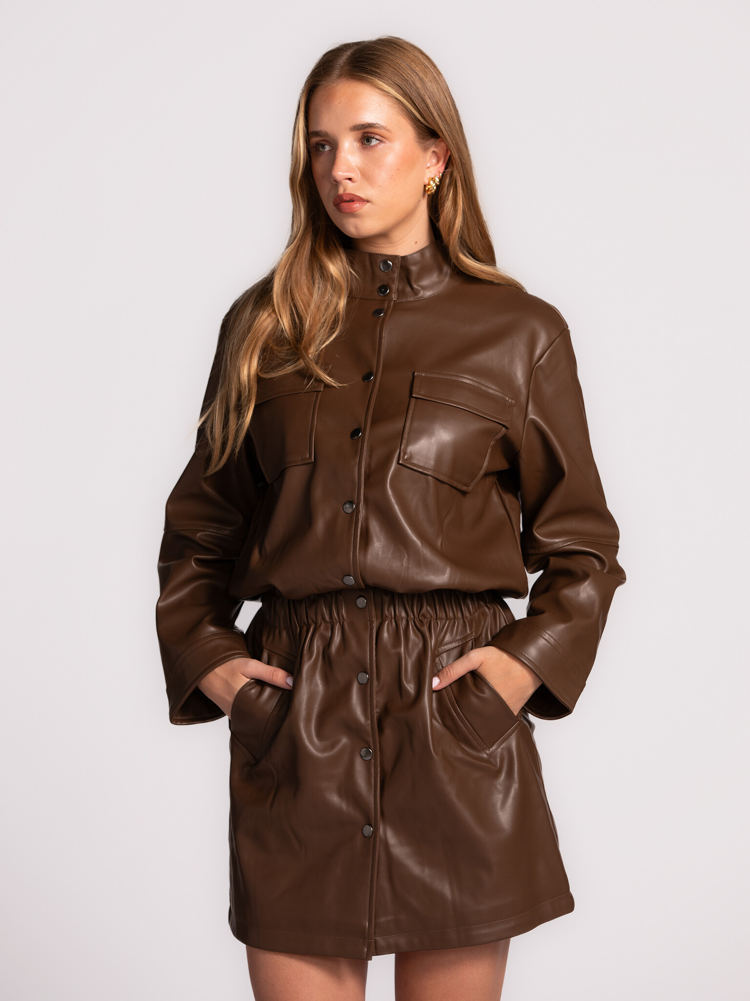 Les Soeurs Vegan leather dress Mitch 3. This brown vegan leather mini dress strikes the perfect balance between edgy and ...