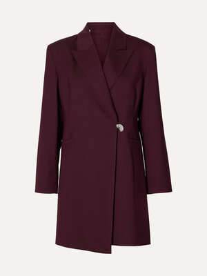 Jurk Lisa. Boardroom ready. Deze blazerjurk ademt business met een elegante twist. De stevige schouders, gecentreerde tai...