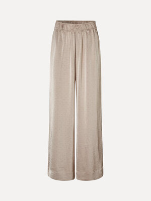 Pantalon Asaka. Shine on. Ce pantalon large avec détails en strass, taille élastique douce et jambes fluides fait briller...