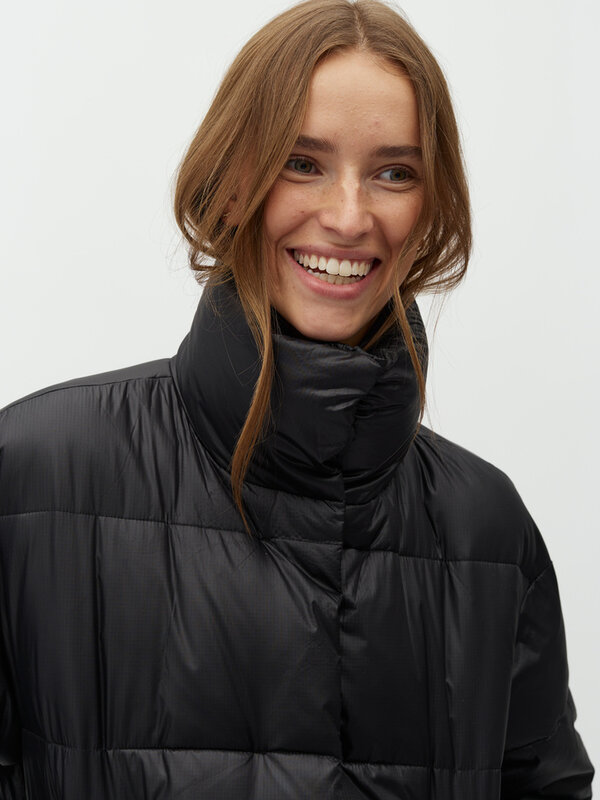 MBYM Long Coat Seraphina Reyan 5. Looking for a warm companion for chilly days? This long black puffer jacket makes every...