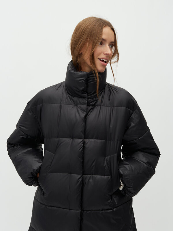 MBYM Long Coat Seraphina Reyan 3. Looking for a warm companion for chilly days? This long black puffer jacket makes every...