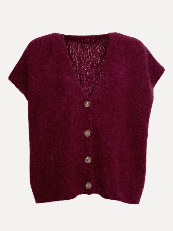 Le Marais Mouwloos gebreid vest Live 2. Ontdek de perfecte balans tussen elegantie en comfort. Dit mouwloze bordeaux vest...