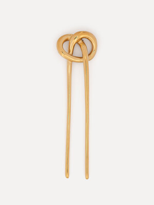 Épingle à cheveux. Une touche d’or. Cette épingle à cheveux dorée est un bijou élégant pour vos cheveux. Chic, intemporel...