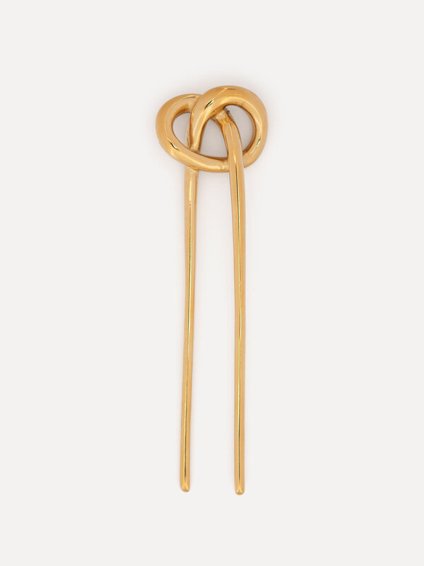 Les Soeurs Épingle de cheveux dorée 1. Une touche d’or. Cette épingle à cheveux dorée est un bijou élégant pour vos cheve...