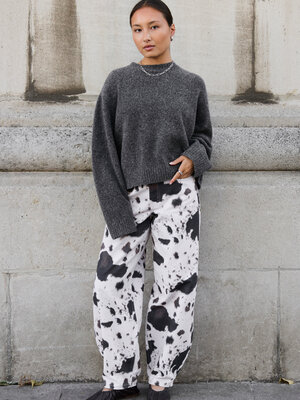 Jeans Chuck. Spotted in style. The cow print is back, straight from the runway to your wardrobe. This all-over print deni...