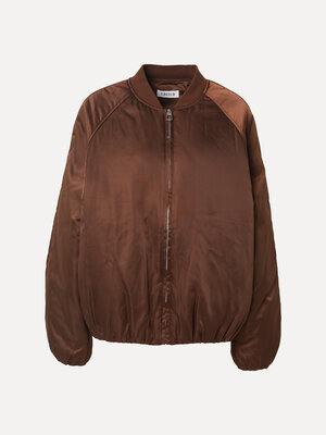 Veste Nada. Couleur de la saison. Ce bomber marron foncé allie élégance et caractère. La teinte riche apporte une touche ...