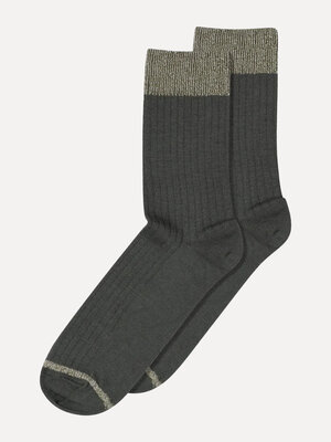 Chaussettes Erina. Les chaussettes en mérinos parfaites pour tous les jours. Le bord pailleté discret apporte une touche ...