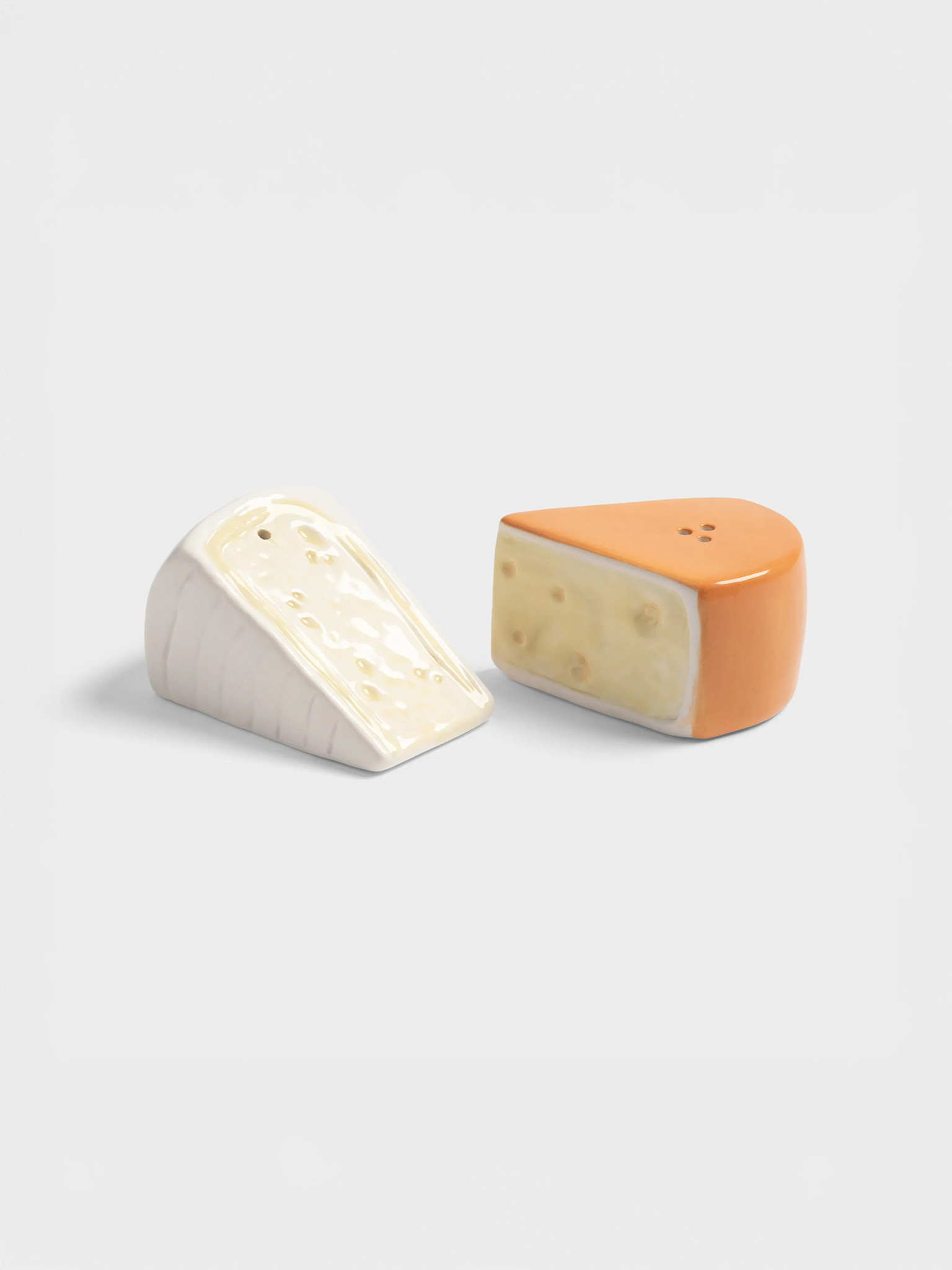 &klevering Salière et poivrière Cheese 1. Cheesy fun ! Ce set sel et poivre est pour les vrais amateurs de fromage. Les f...