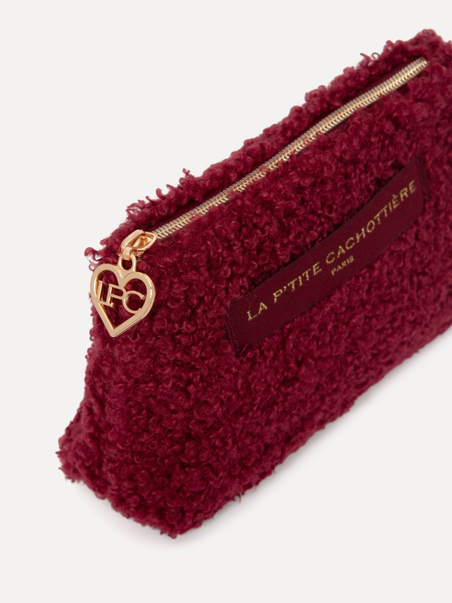 Le Marais Teddy Pouch Iza 2. This mini teddy pouch in bordeaux is small in size but big on style. Perfect for on-the-go o...