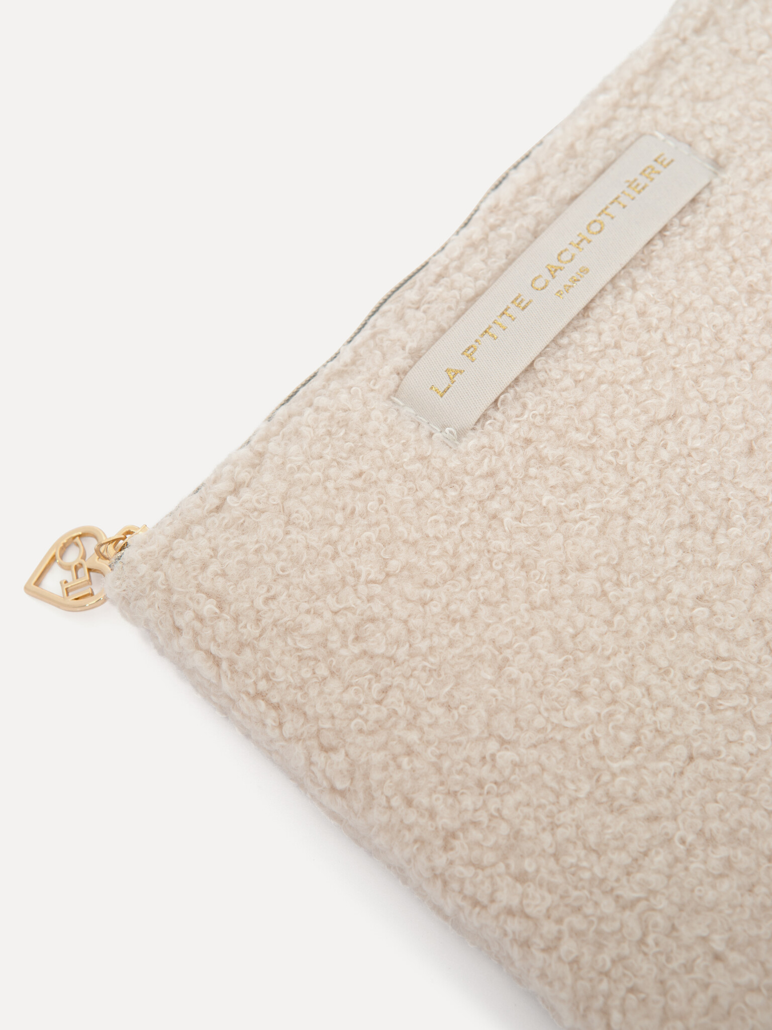 Le Marais Teddy Pouch Iza 2. This mini teddy pouch in beige is small in size but big on style. Soft and cuddly, it keeps ...