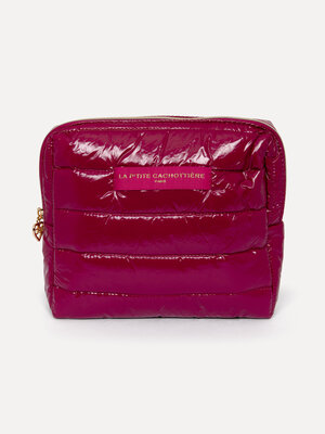 Trousse de toilette Iza. Shine on. Cette trousse XL brillante est un véritable accroche-regard sur votre coiffeuse. Son g...