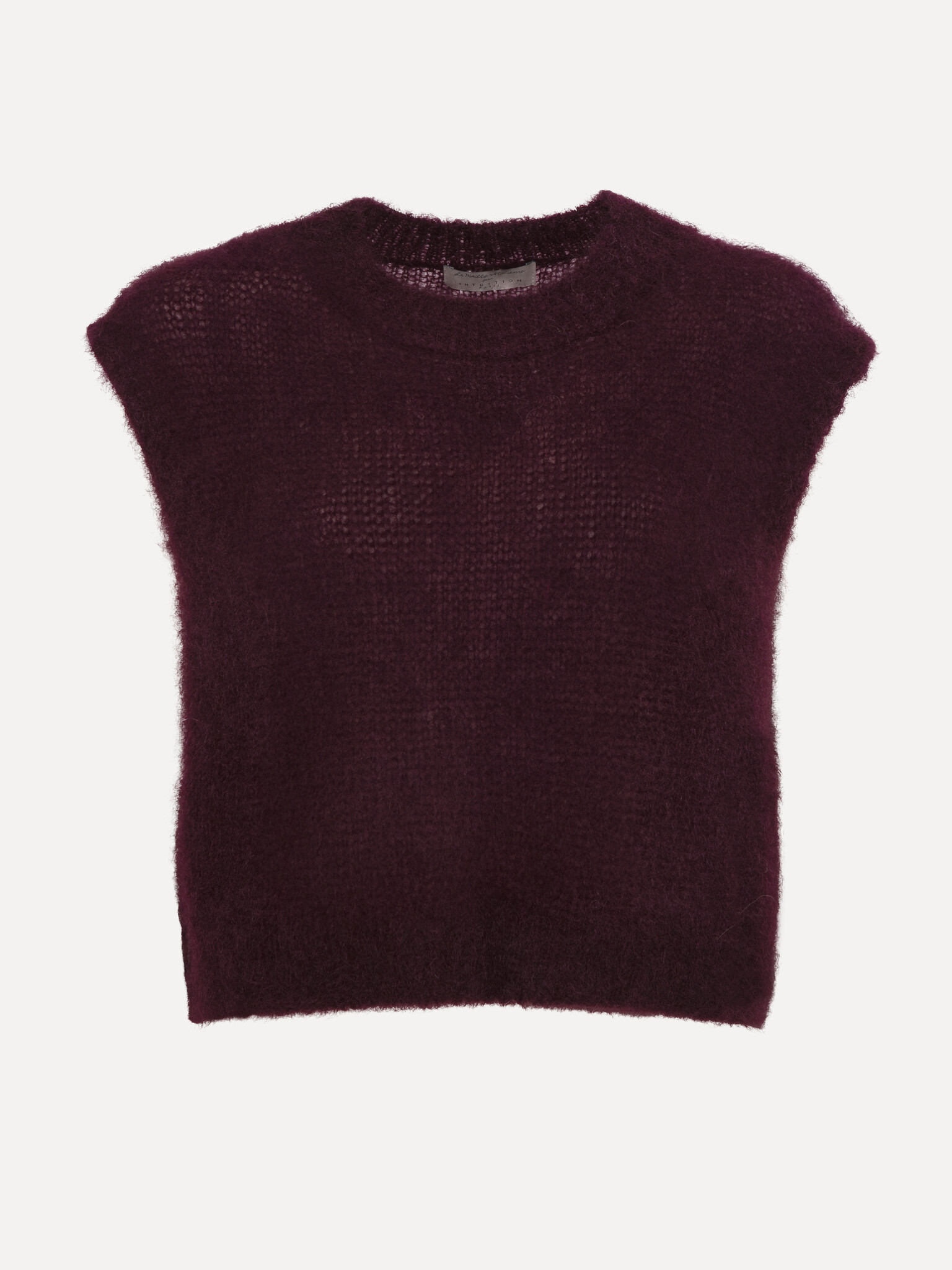 Le Marais Gebreide Spencer Zoey 2. Deze bordeaux mouwloze spencer voelt zacht & comfortabel aan en heeft een moderne, sti...