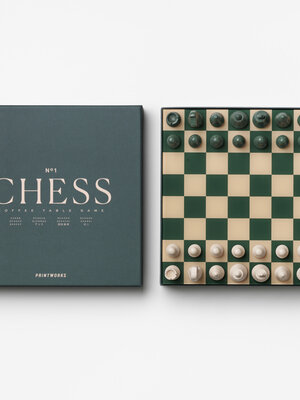 Chess game Classic. This dark green chess set combines timeless strategy with endless gameplay. The meticulously crafted ...