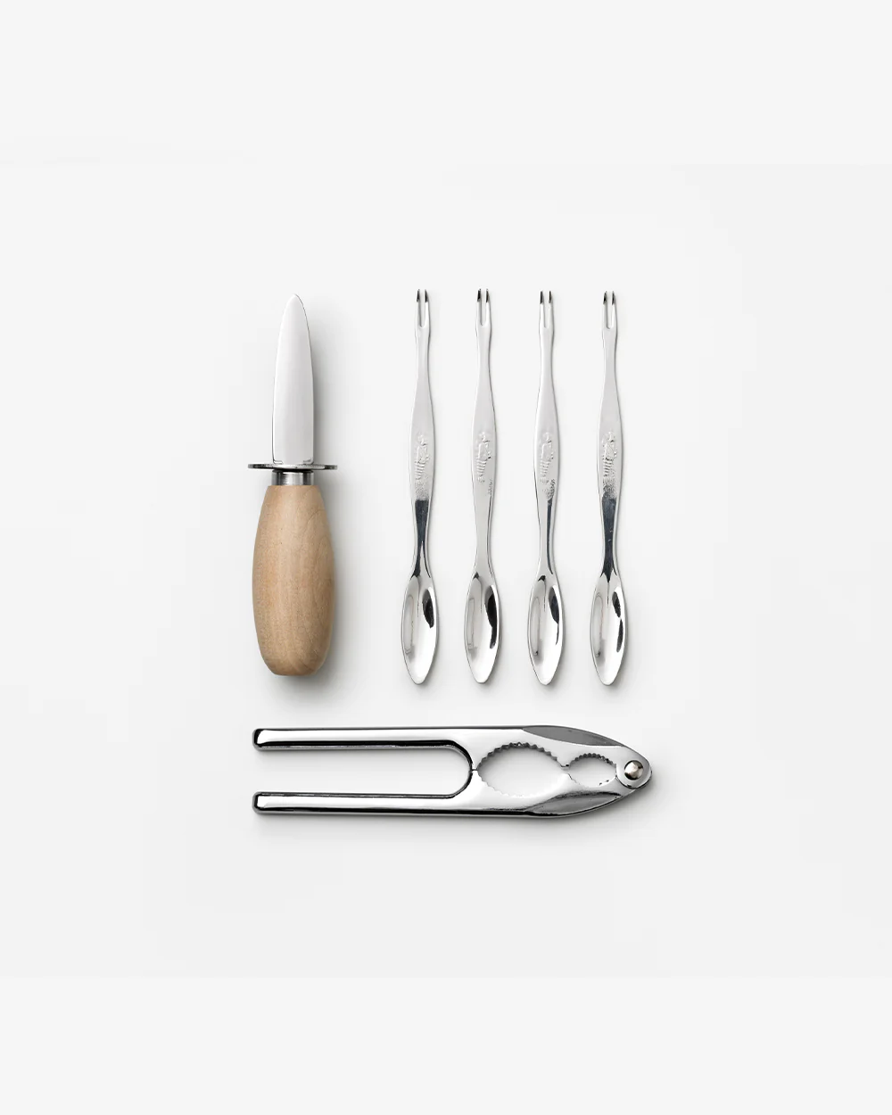 Printworks Geschenkdoos Seafood tools 4. Ontdek een zee van plezier met deze seafood tools geschenkdoos. In een boekvormi...