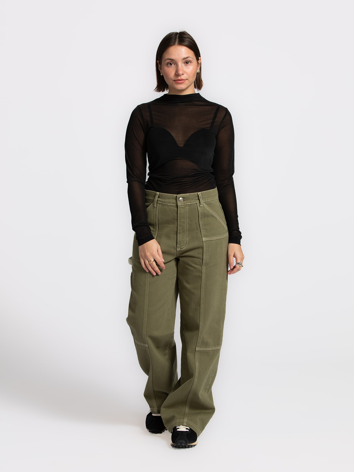 Edited Mesh longsleeve Leela 3. This black mesh longsleeve adds a refined edge to any outfit. The sheer fabric reveals su...
