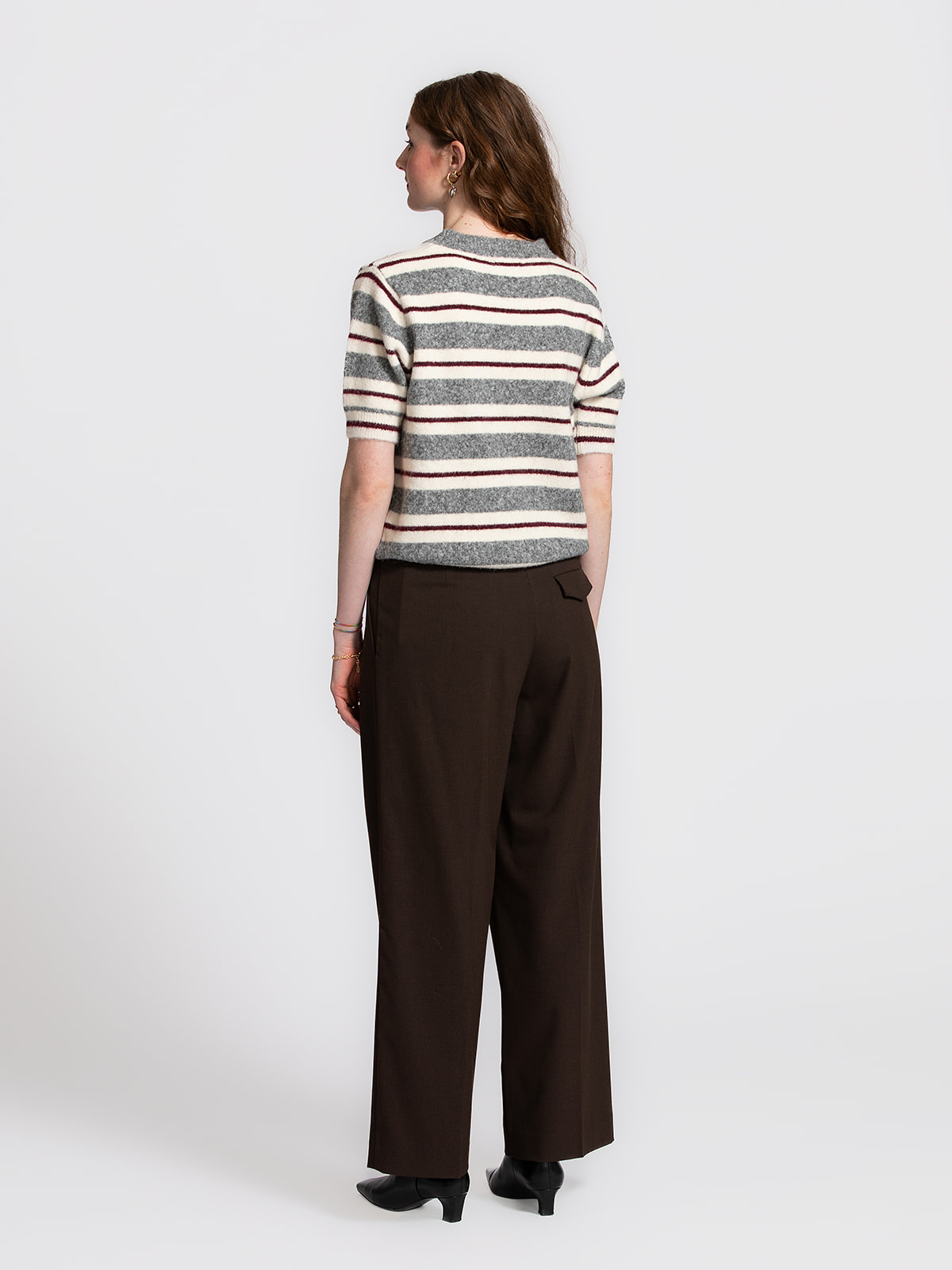 Selected Wide trousers Sienna 5. Perfectly tailored. These matching brown trousers feature an elegant wide-leg fit with a...