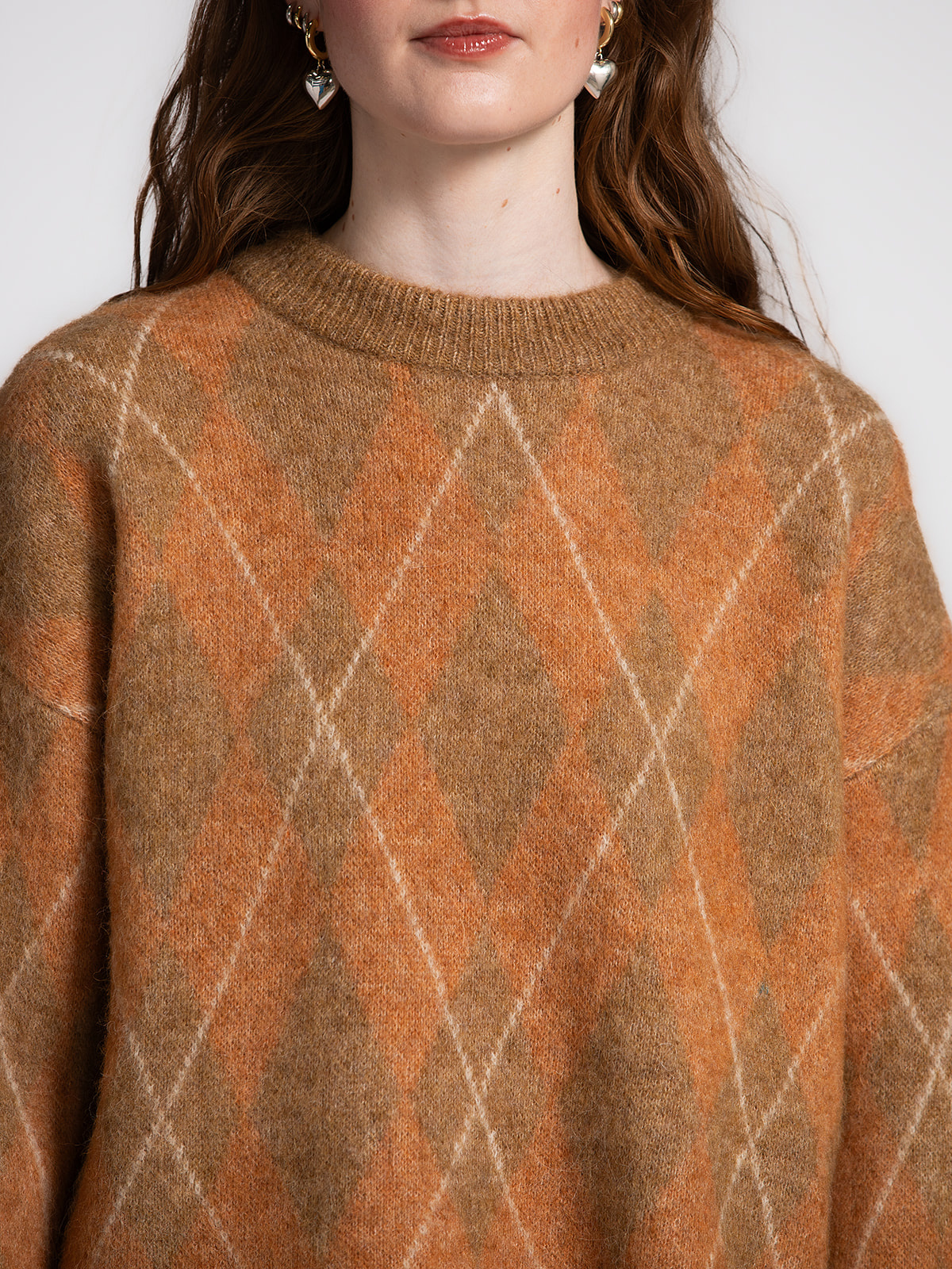 Selected Gebreide trui Lulu 4. Classic charm, modern twist. Deze wollen knit met tijdloos argyle patroon combineert een t...