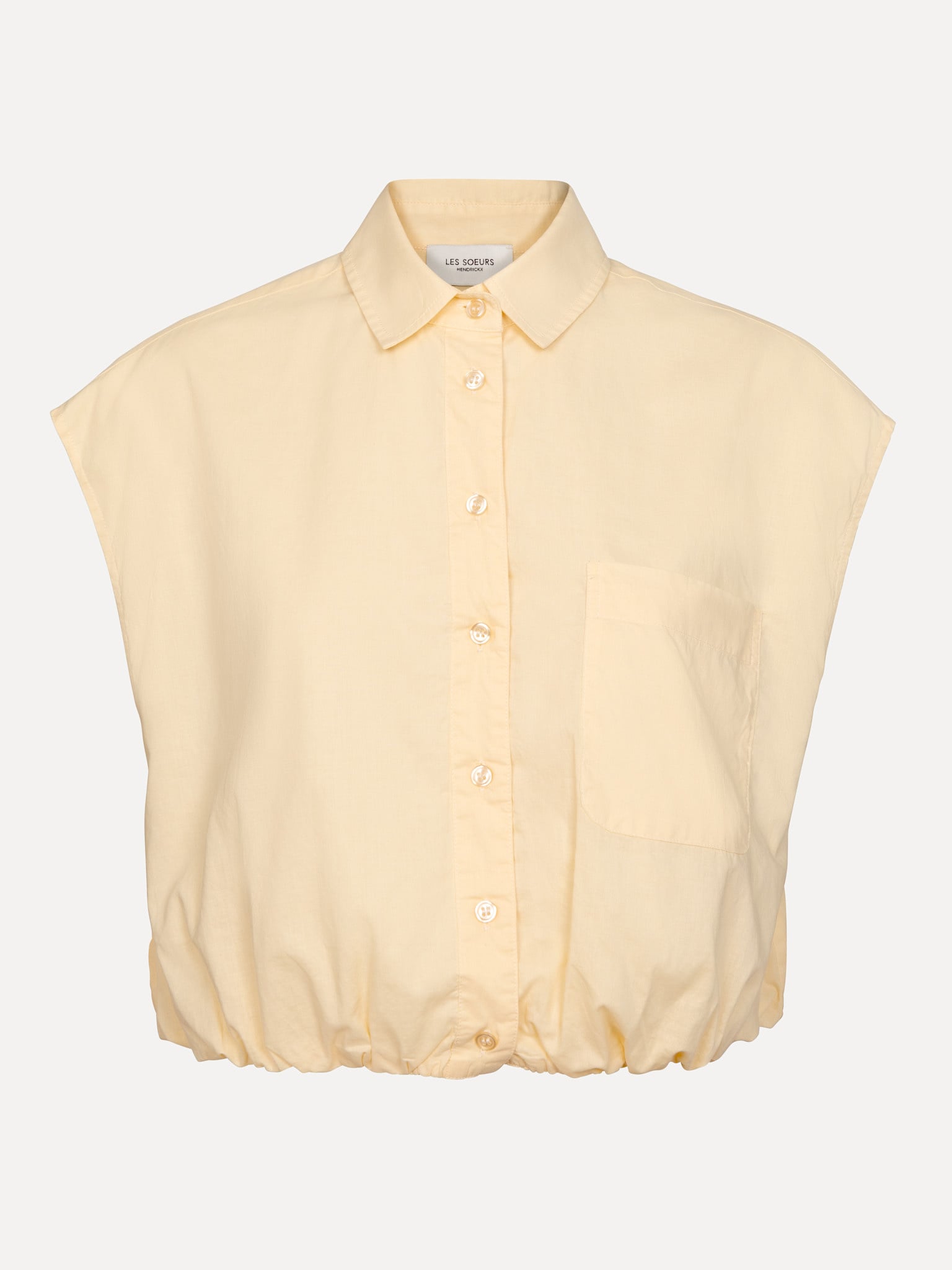 Les Soeurs blouse sans manches Blue 2. Touched by the sun. La teinte chaude et la forme ample apportent une sensation dou...