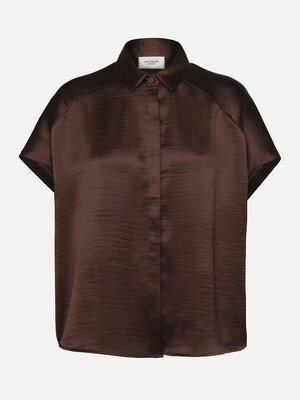 Blouse Aiko. Une brillance subtile. La légère brillance et les lignes douces confèrent à cette blouse une allure raffinée...