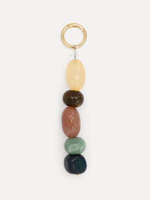 Bag Charm. A touch of nature. This bag charm adds a subtle, natural accent to your look. Soft, earthy tones give your bag...