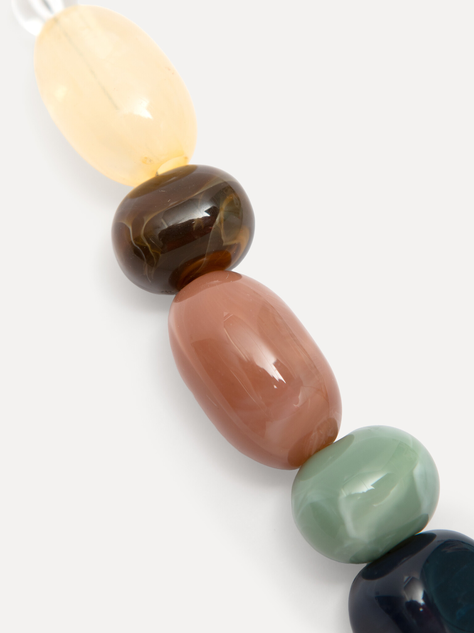 Les Soeurs Bijou de sac Stones 2. Une touche de nature. Ce charm apporte un accent subtil et naturel à votre look. Les to...