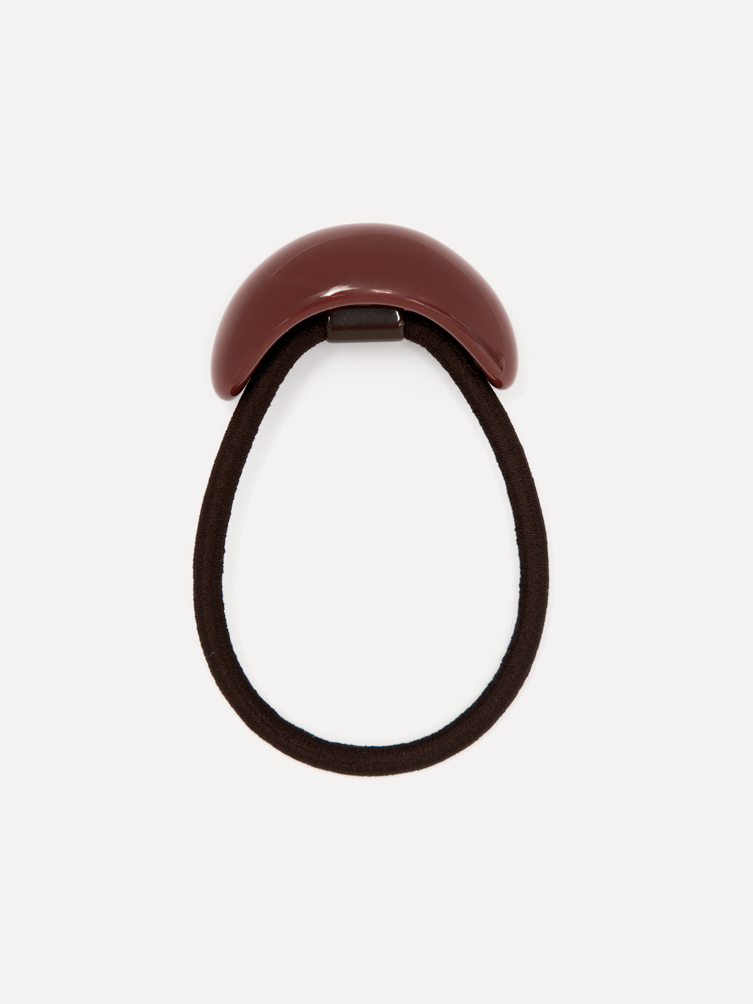 Les Soeurs Haarelastiek resin dome 1. Bold curve. Een haarelastiek in diepe burgundy met dikke, gebogen vorm dat je kapse...