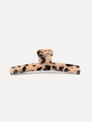 Hair clip. Soft statement. With its long shape and light tortue finish, this hair clip adds an effortless touch to your h...
