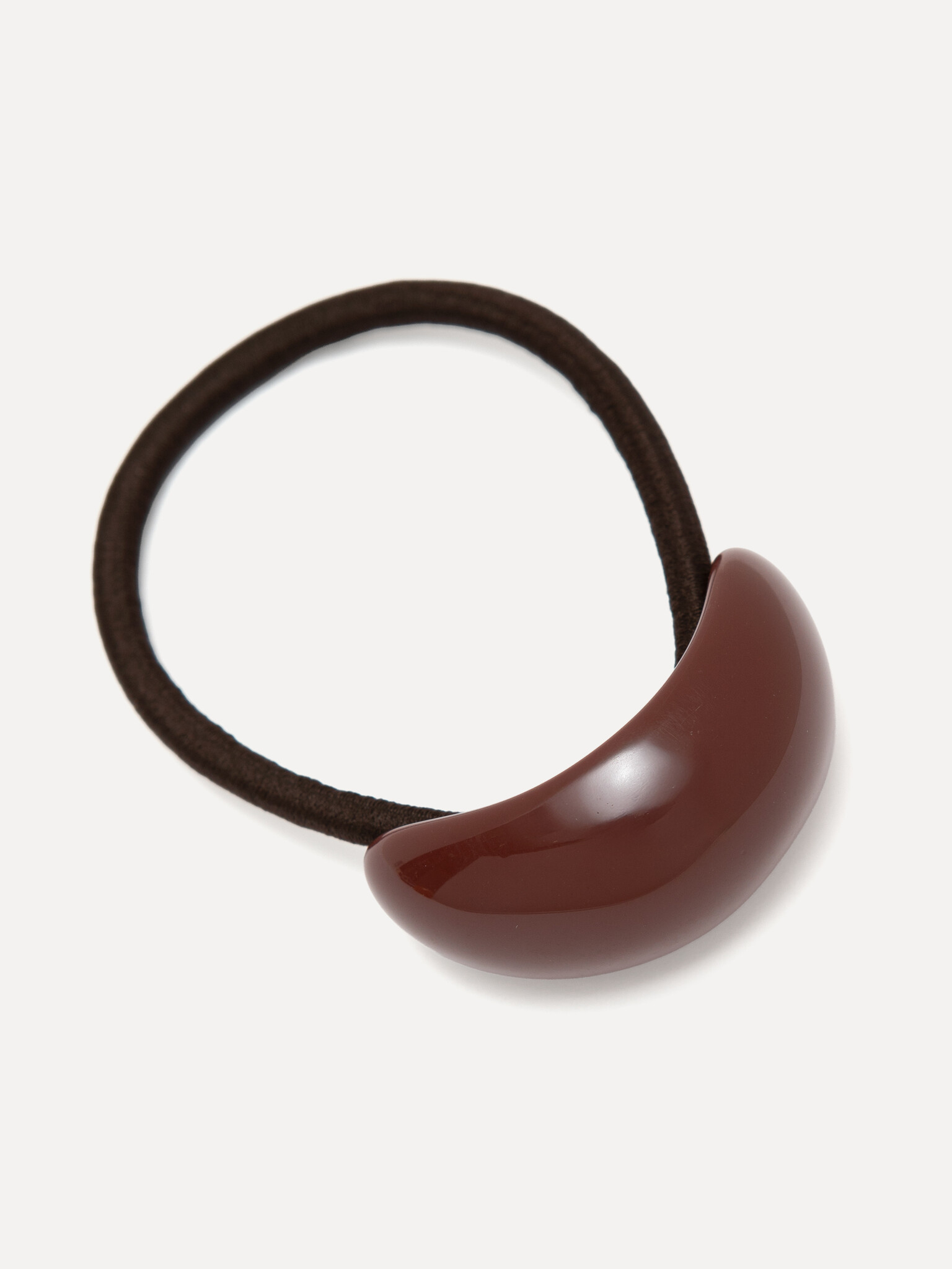 Les Soeurs Haarelastiek resin dome 3. Bold curve. Een haarelastiek in diepe burgundy met dikke, gebogen vorm dat je kapse...