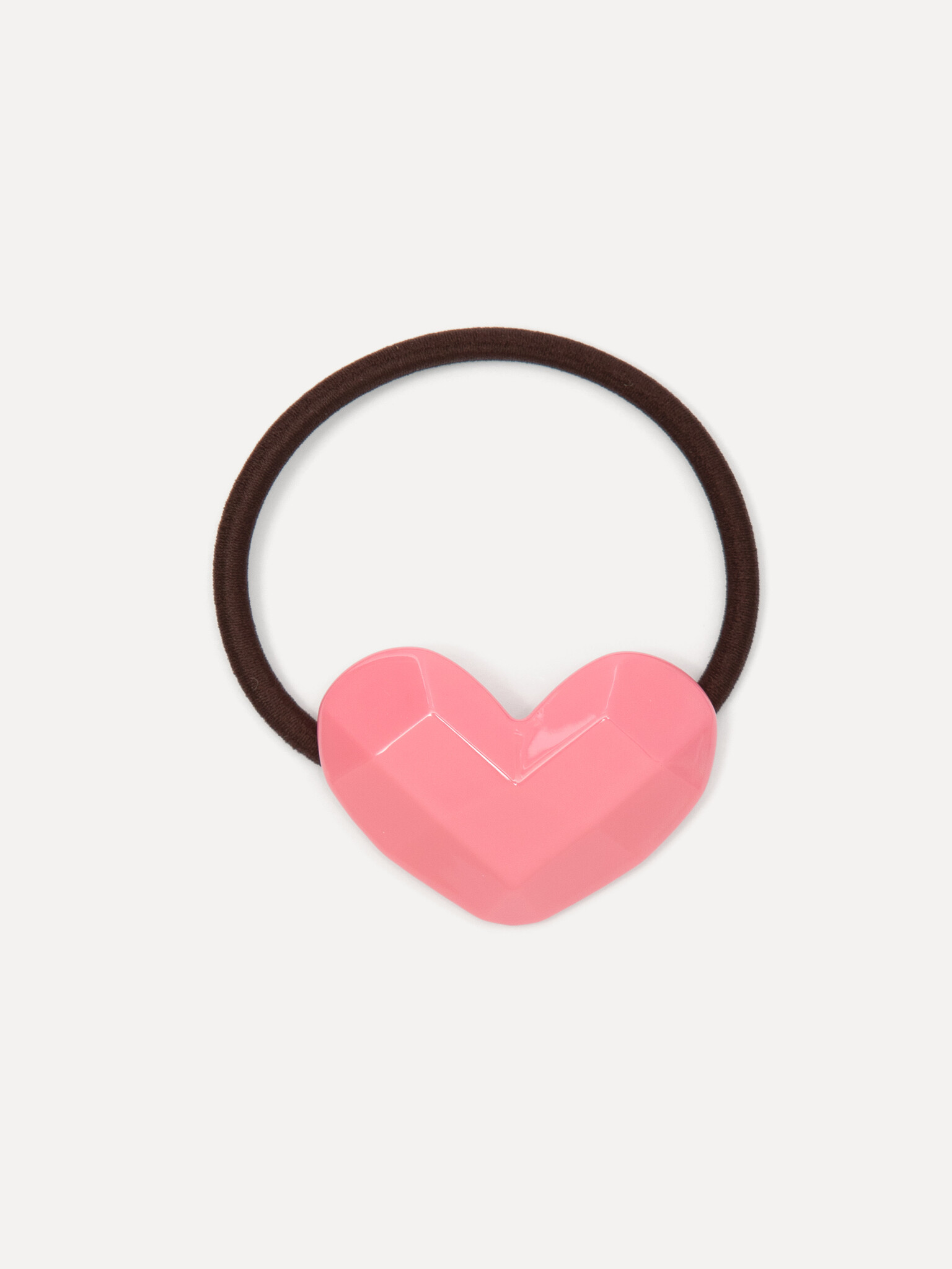 Les Soeurs Haarelastiek resin heart 2. Everyday charm. Een eenvoudig haarelastiek met hartje dat je kapsel moeiteloos afm...