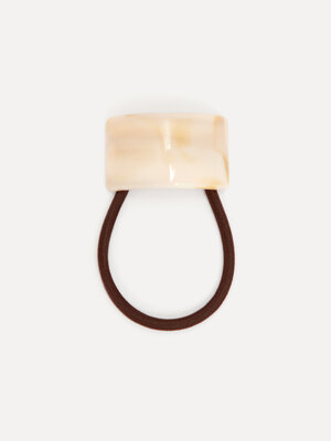 Hair tie. Everyday elegance. A small hair tie with a curved accent that keeps your hairstyle neatly in place and adds a p...