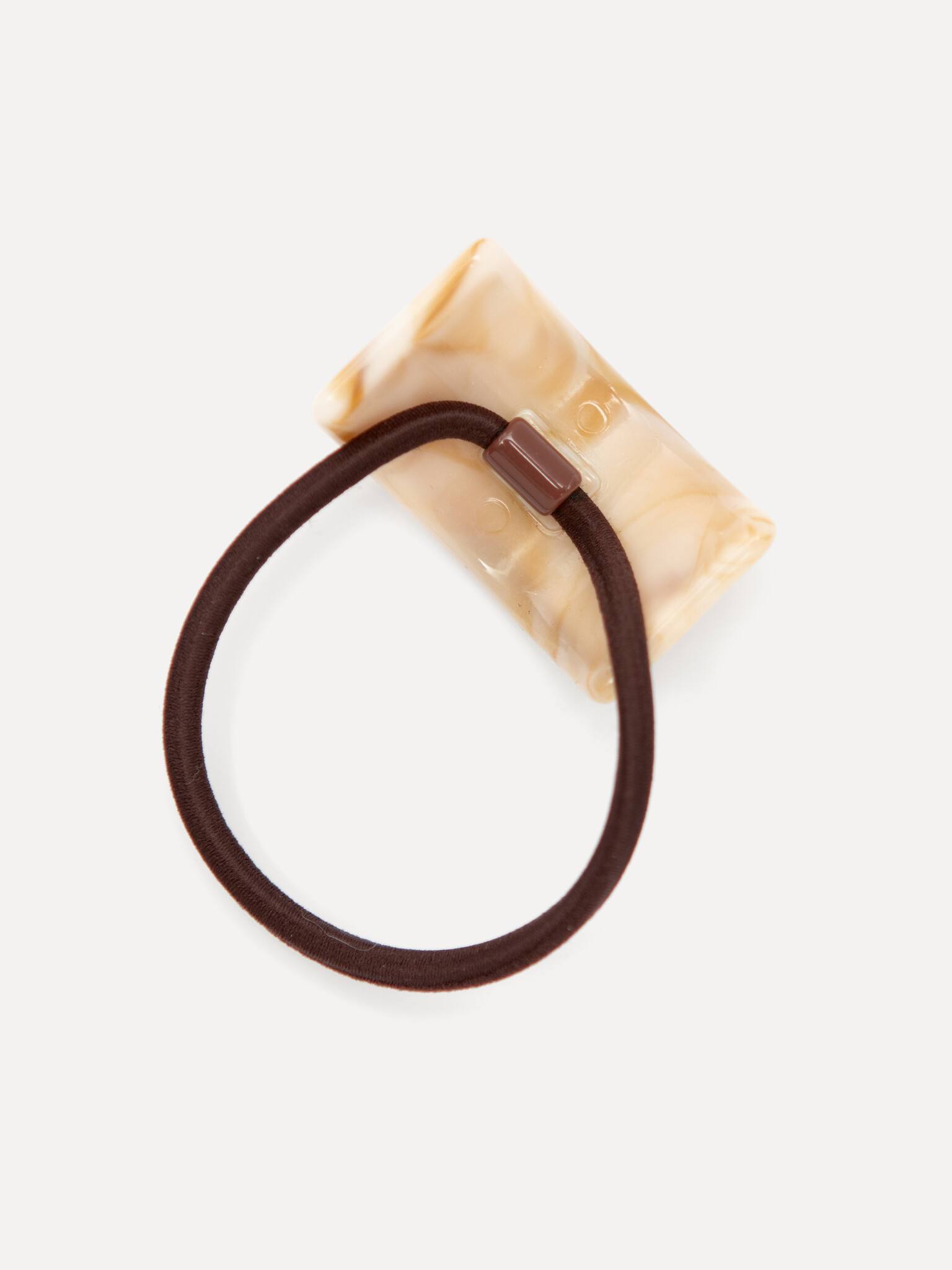 Les Soeurs Haarelastiek resin arch 2. Everyday elegance. Een klein haarelastiek met gebogen accent dat je kapsel netjes h...