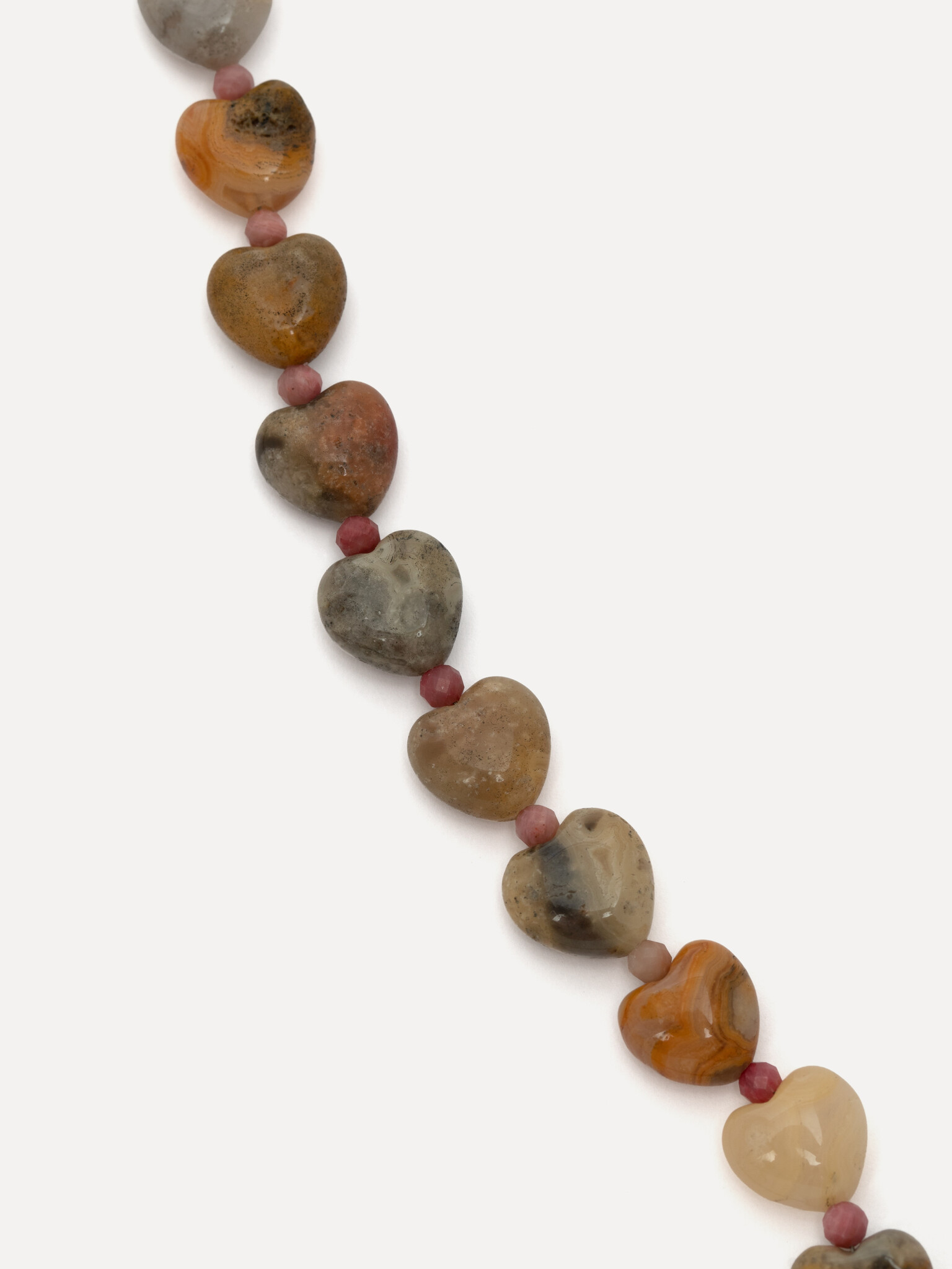 Les Soeurs Necklace Amelie hearts 2. This necklace feels like a collection of small moments. The heart-shaped stones and ...