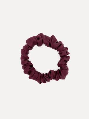 Silk Scrunchie. Soft confidence. The deep burgundy hue adds warmth, while the soft fabric keeps your hair comfortably in ...