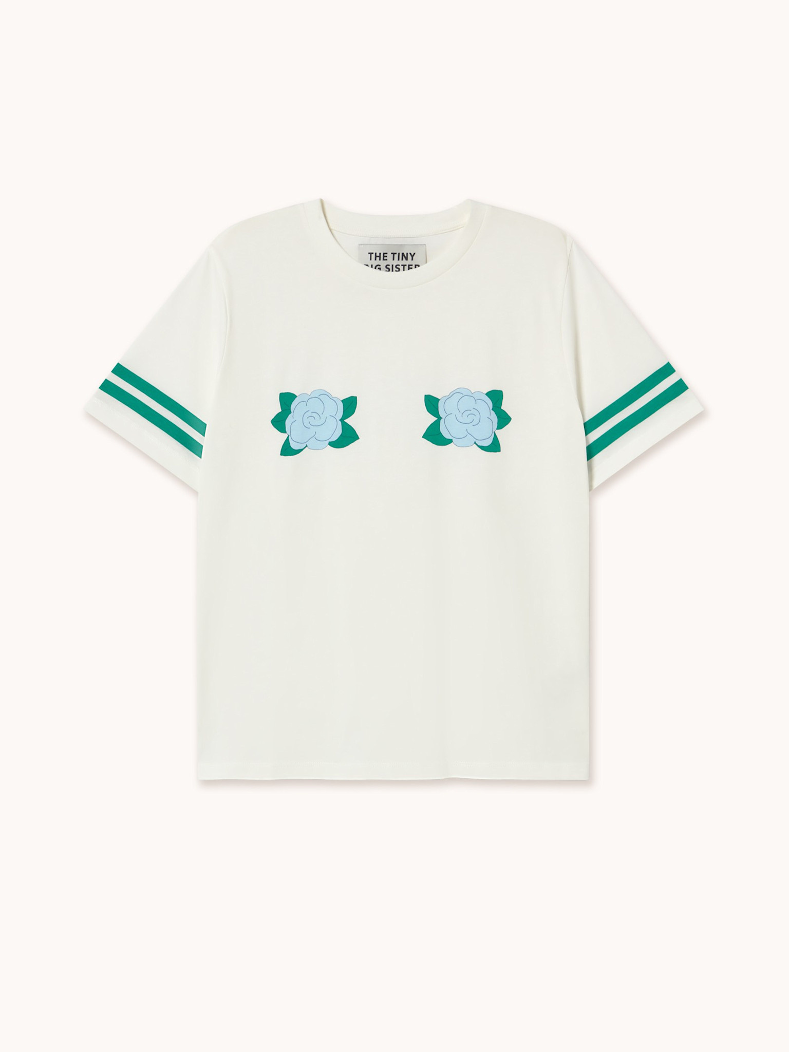 The tiny big sister T-shirt Roses 2. Un classique revisité. L’imprimé floral doux contraste joliment avec les lignes spor...