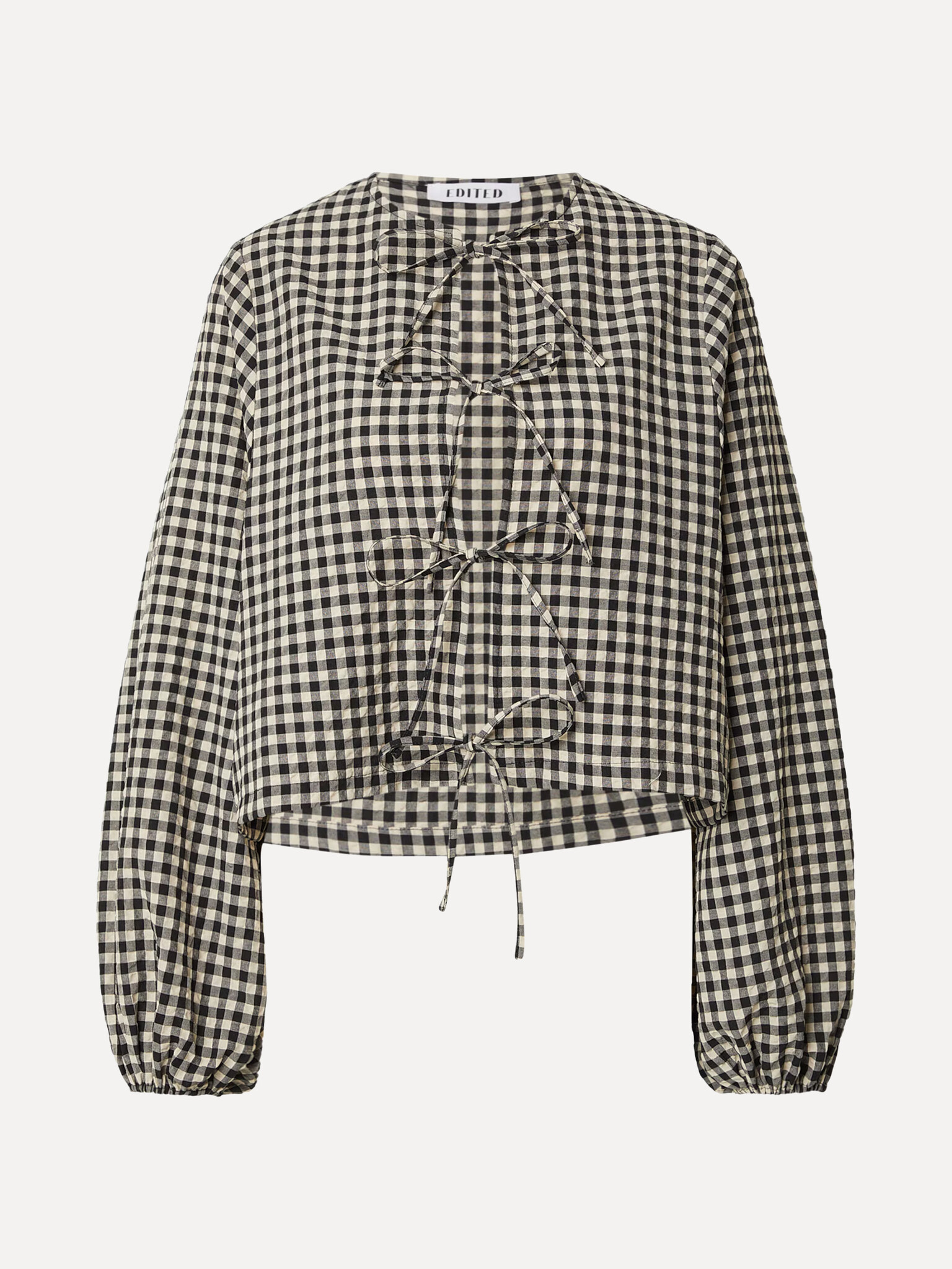 Edited blouse  avec détail nœud Lisanne 2. A touch of elegance. La blouse Lisanne tombe légèrement et épouse le corps ave...