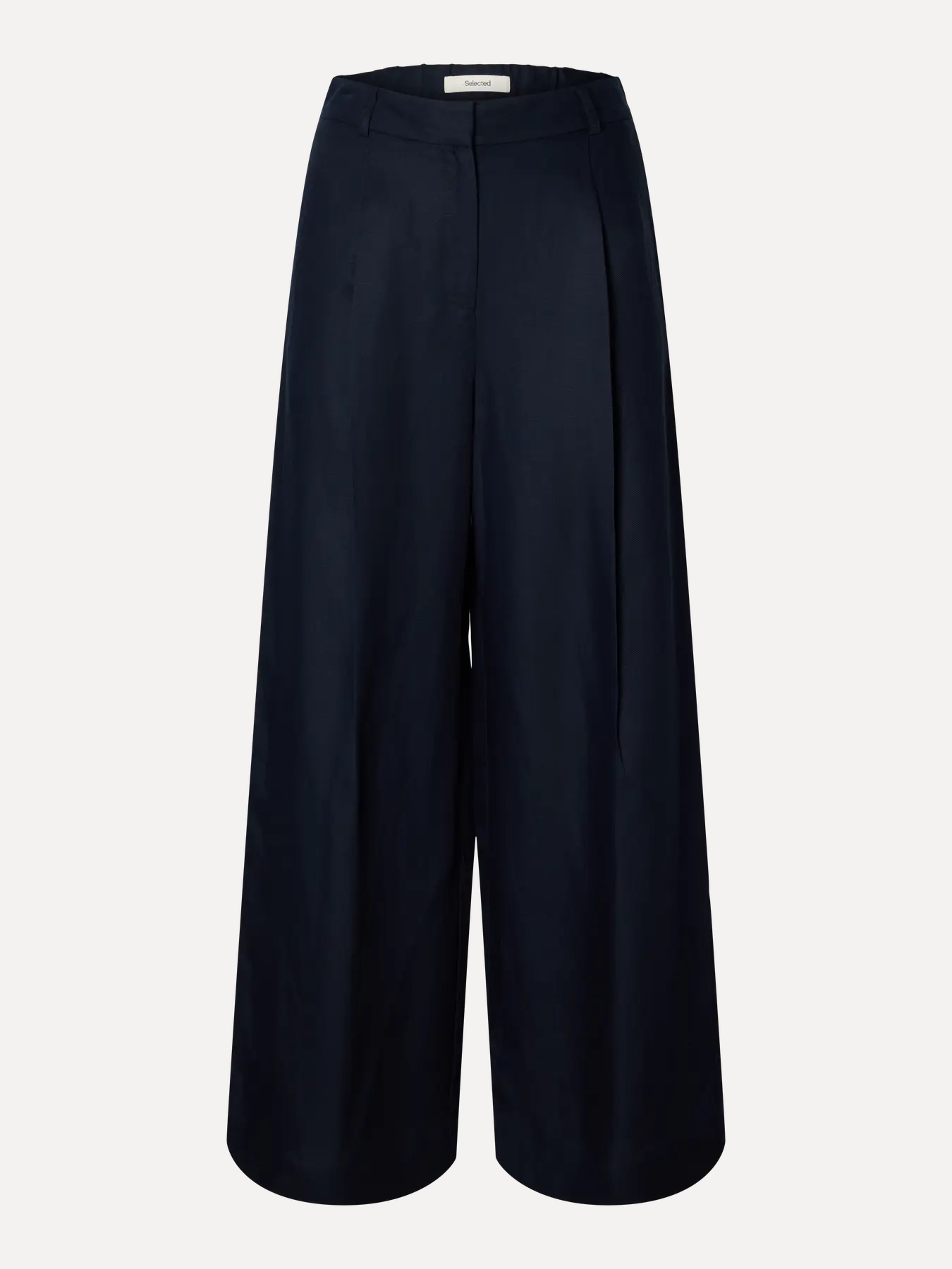 Selected wijde broek Lyra 2. Midnight minimal. Cleane lijnen en een vloeiende pasvorm geven deze broek een ingetogen eleg...