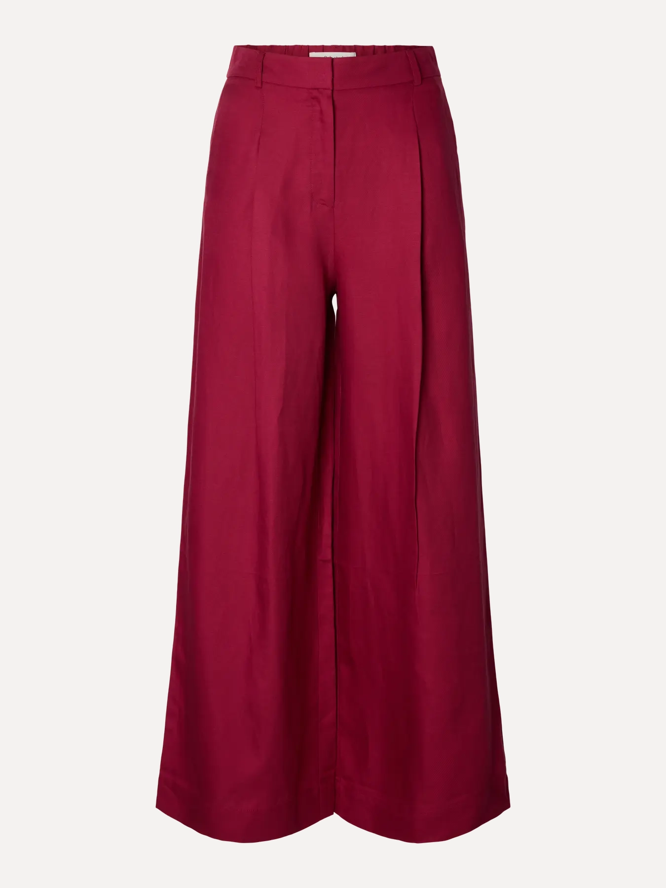 Selected wijde broek Lyra 2. Een silhouet dat spreekt. De hoge taille accentueert subtiel, terwijl de wijde pijpen voor e...