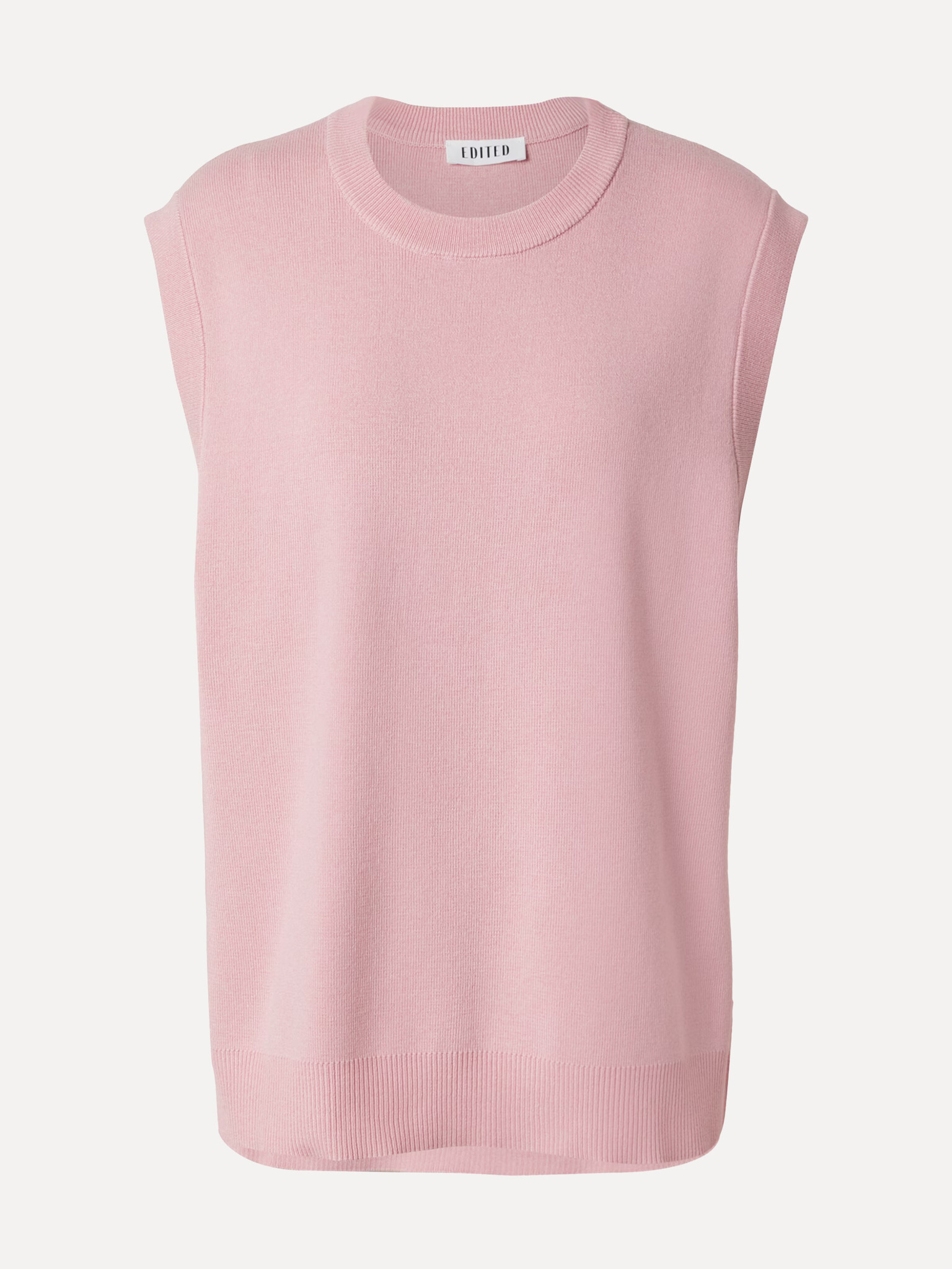 Edited mouwloze trui Thanya 2. Soft pink, modern ease. Thanya is een mouwloze knit met cleane lijnen en een tijdloze uits...