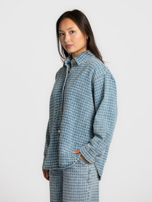 Denim Shirt Cosette. This shirt proves that details make the difference. It plays with texture and lines, creating a stro...