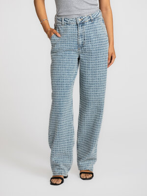 Jean Gigi. These textured denim jeans feel familiar, yet slightly richer. The subtle structure adds depth to your look wi...