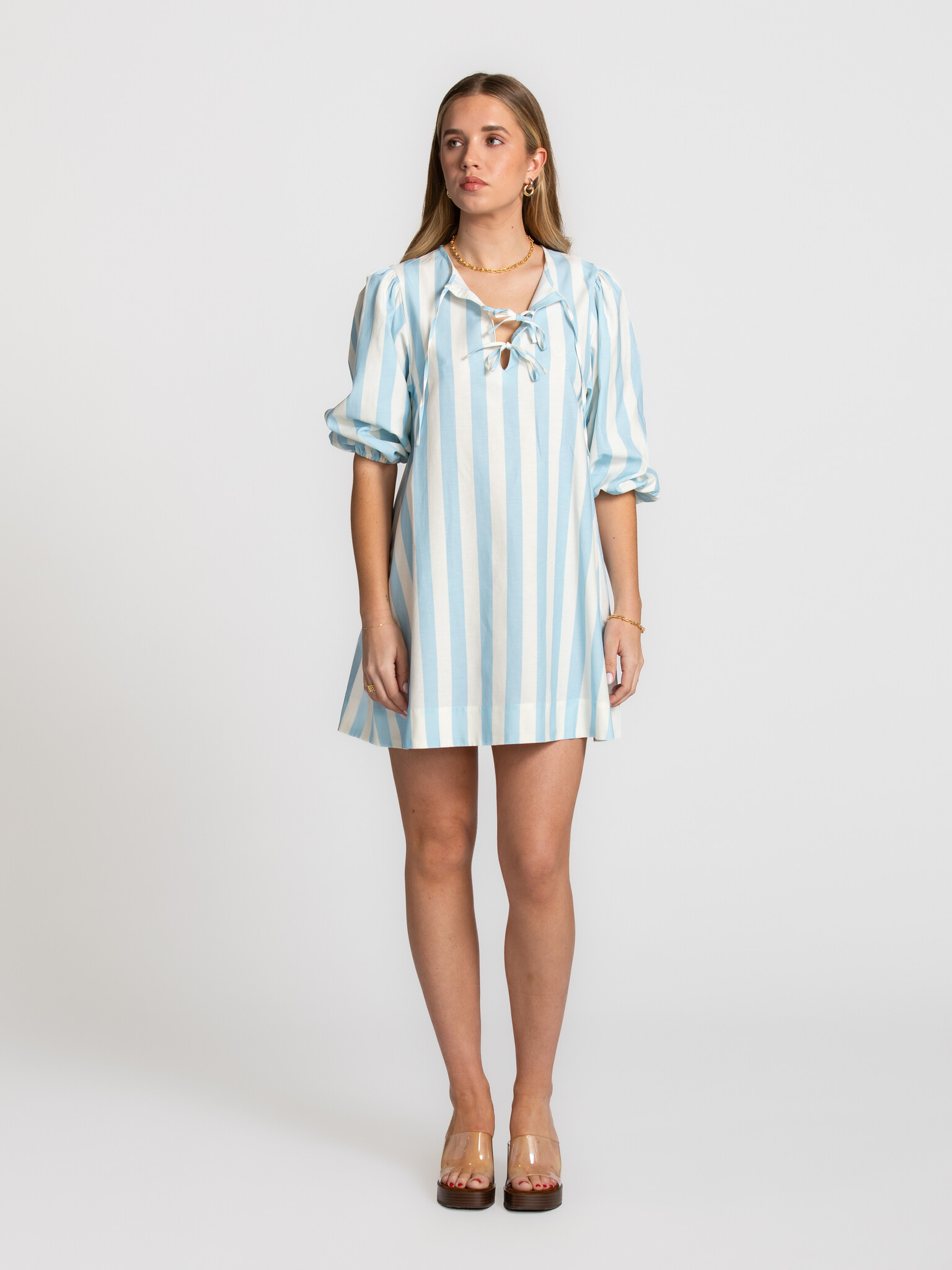 The tiny big sister striped puff sleeve dress 1. Statement in stripes. The bold stripes and subtle bow details give this ...