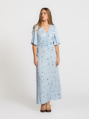 Robe Ineya. Soft florals. Cette longue robe associe un imprimé floral doux à une silhouette fluide et élégante. Les plis ...