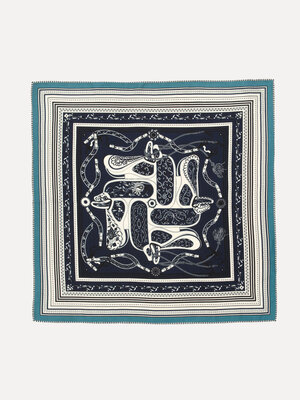 Scarf. Not just an accessory. This scarf feels like a find. Something with character, with a unique look. Loosely tied, a...