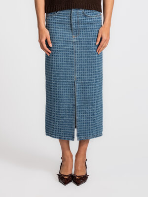 Jupe midi Polly. Denim intemporel. Cette jupe séduit par sa texture subtile et son allure durable. La longueur midi et la...