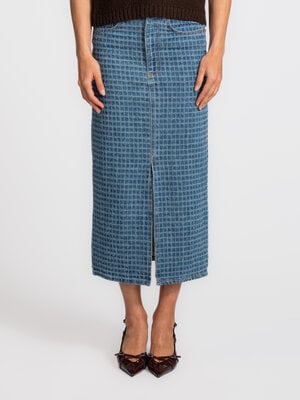 Midi rok Polly. Tijdloos denim. Deze rok valt op door zijn subtiele structuur en tijdloze uitstraling. De midi lengte en ...