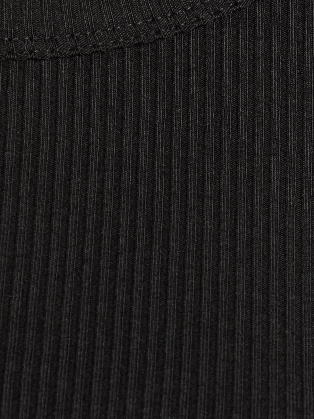 Selected ribbed tank top Anna 6. The power of black. This black tank top brings simplicity and elegance together. The rib...