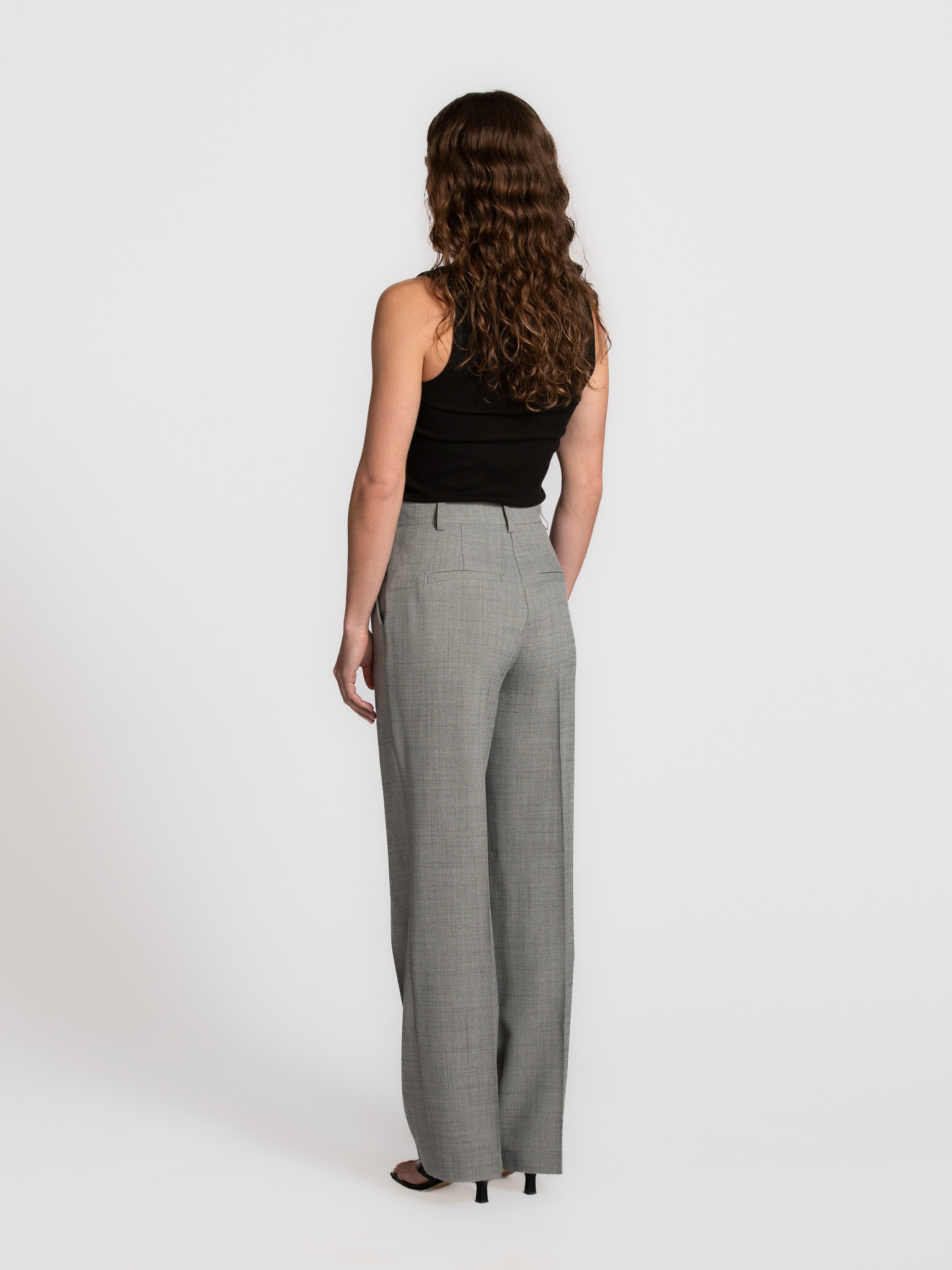 Selected ribbed tank top Anna 5. The power of black. This black tank top brings simplicity and elegance together. The rib...