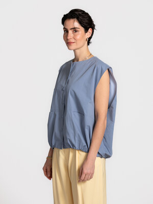 Sleeveless bomber. An extra layer that makes everything more interesting. This sleeveless bomber falls loose and airy whi...