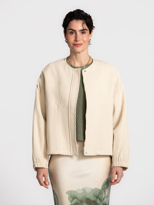 Jacket Carola. Subtle texture, effortless layering. The jacket features a relaxed silhouette and a soft textured fabric t...