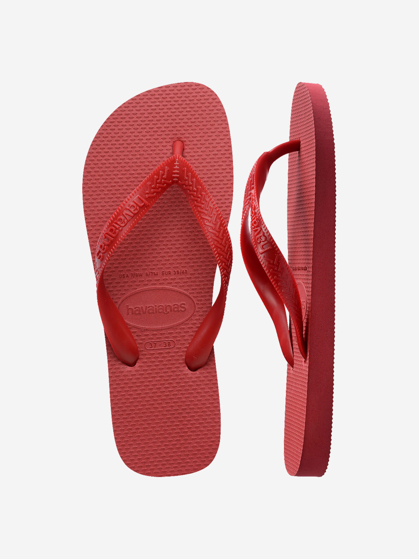 Havaianas Top 2. Een klein accent dat alles verandert. Deze rode slippers brengen warmte en energie in je look. Je schuif...